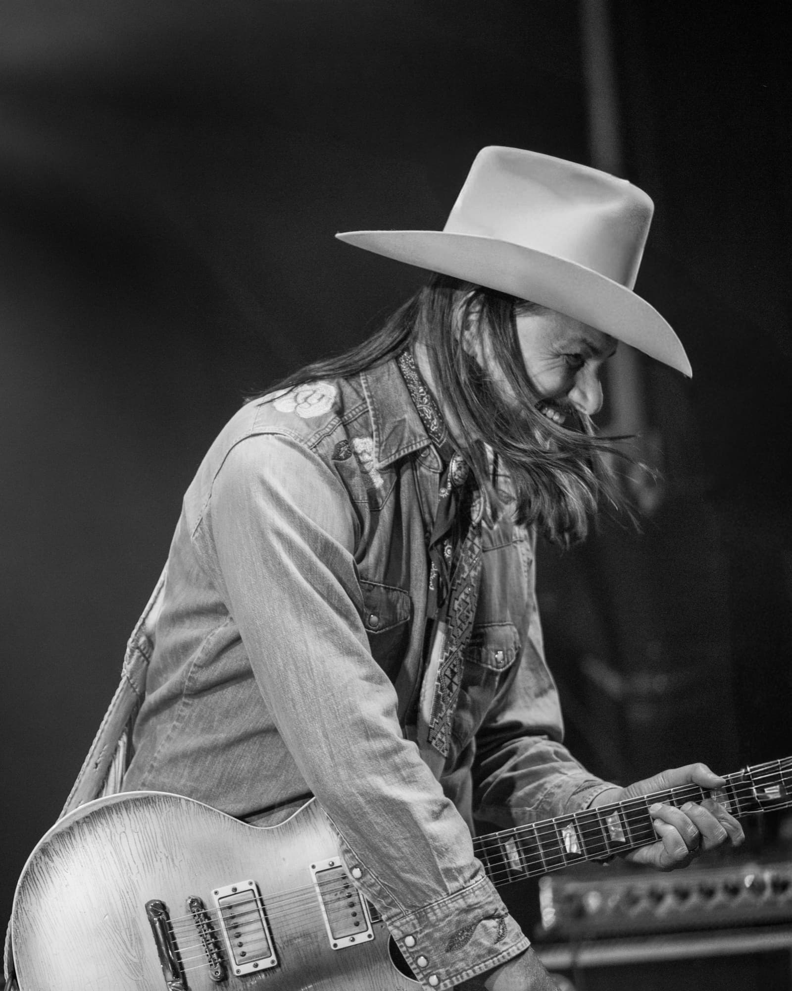 Duane Betts performing on stage at the Horseshoe Music Festival